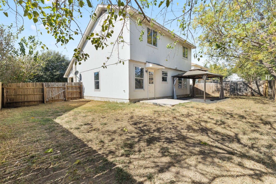 102 Orange Tree Lane Georgetown, TX 78626 - Photo 30 of 31 a view of a house with a yard