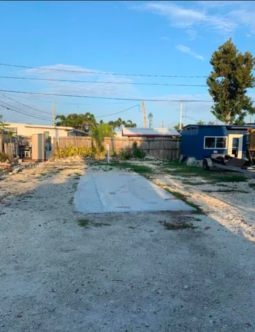 a view of a yard with an outdoor space
