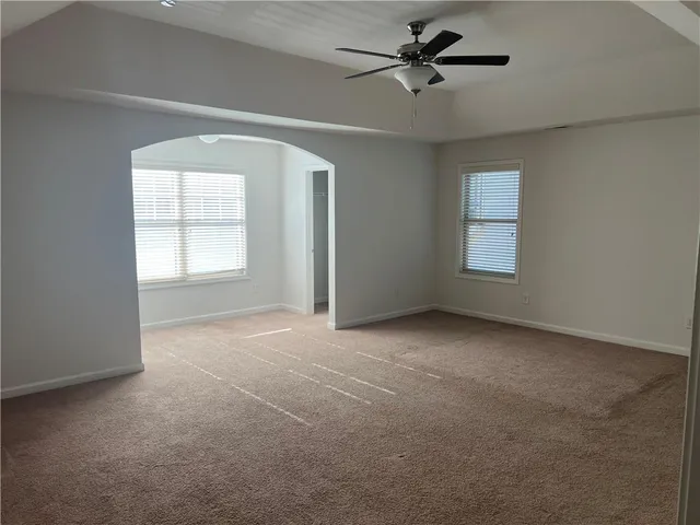 a view of a room that has a window in it