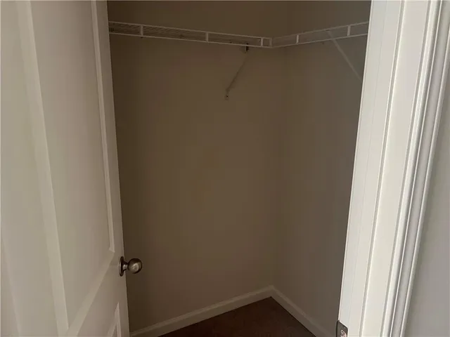 a white bath tub sitting in a bathroom