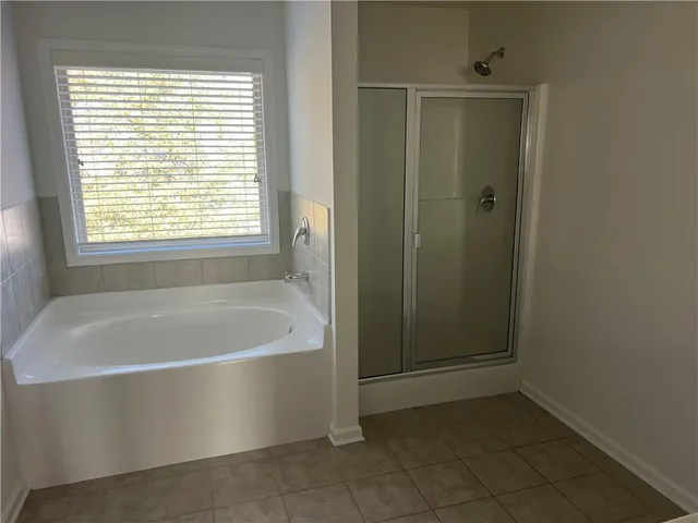 a utility room with a sink washer and dryer