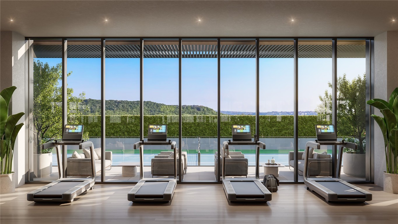 6507 Bridge Point Parkway, Unit LOT 4 Austin, TX 78730 - Photo 11 of 19 a view of room with gym equipment and floor to ceiling window