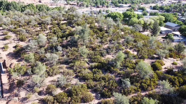 a view of a street with a large parking space
