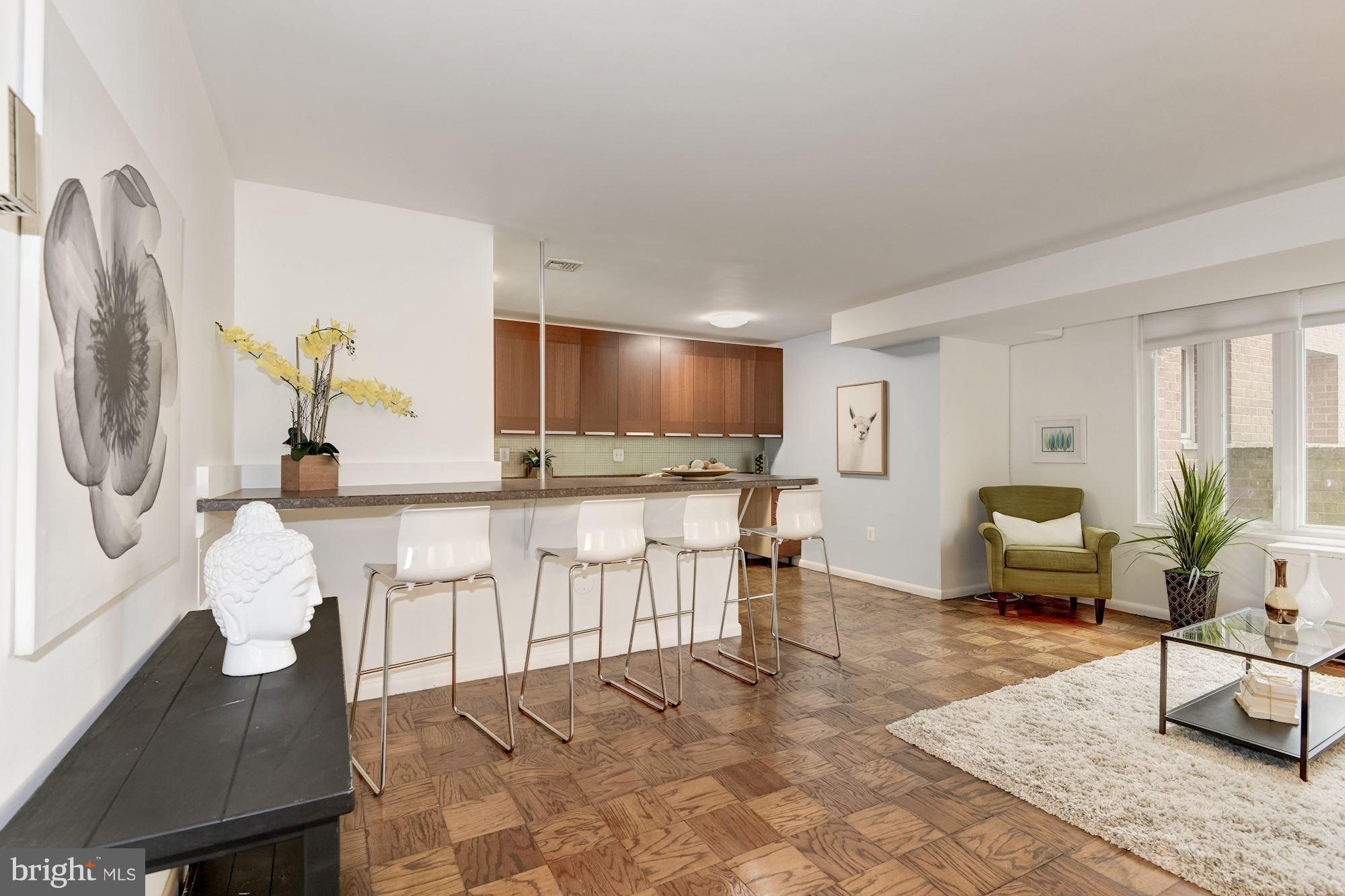 2400 41st Street Northwest, Unit 103 Washington, DC 20007 - Photo 3 of 19 Open flexible living space