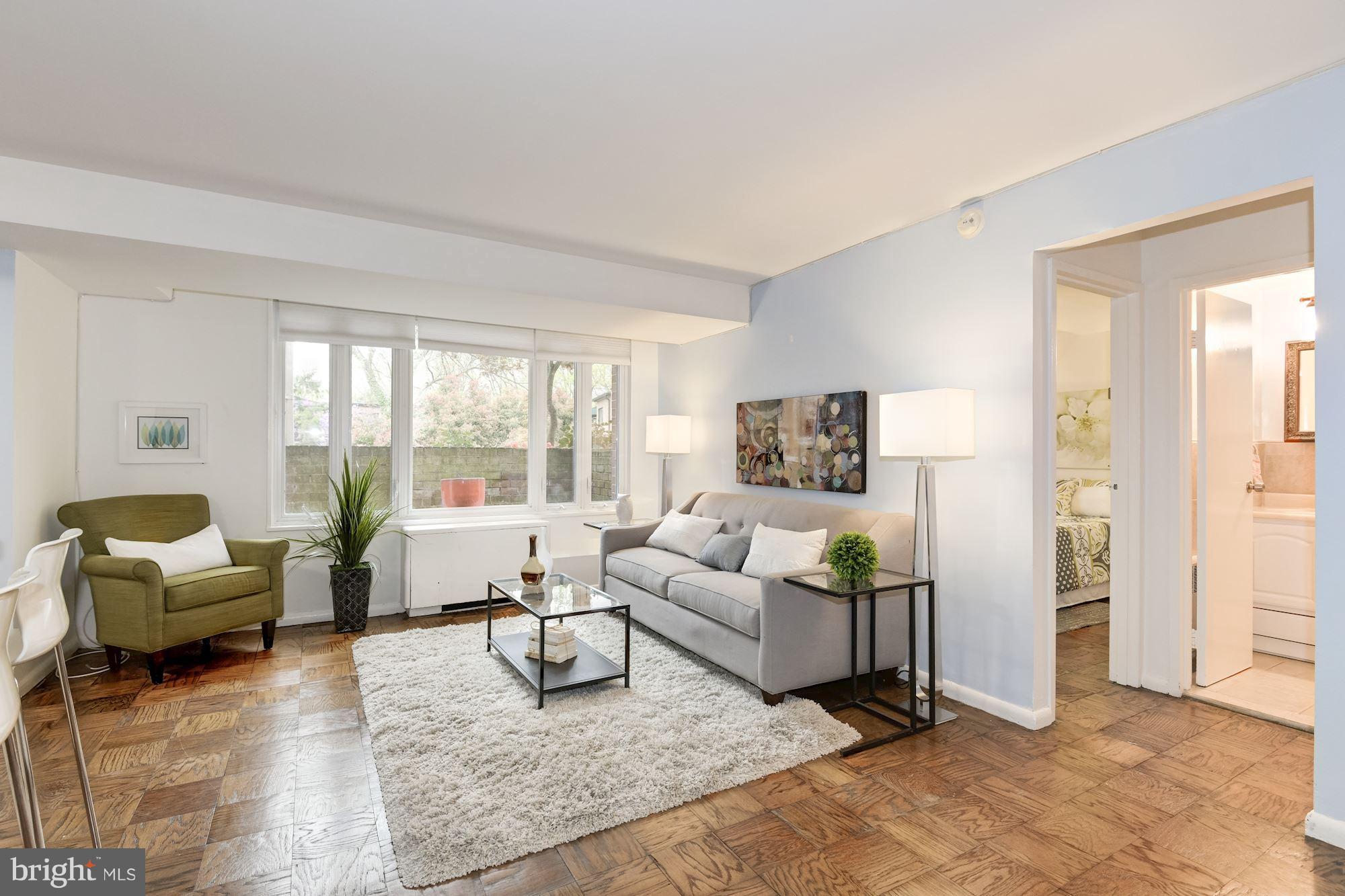 2400 41st Street Northwest, Unit 103 Washington, DC 20007 - Photo 5 of 19 Large window in living area