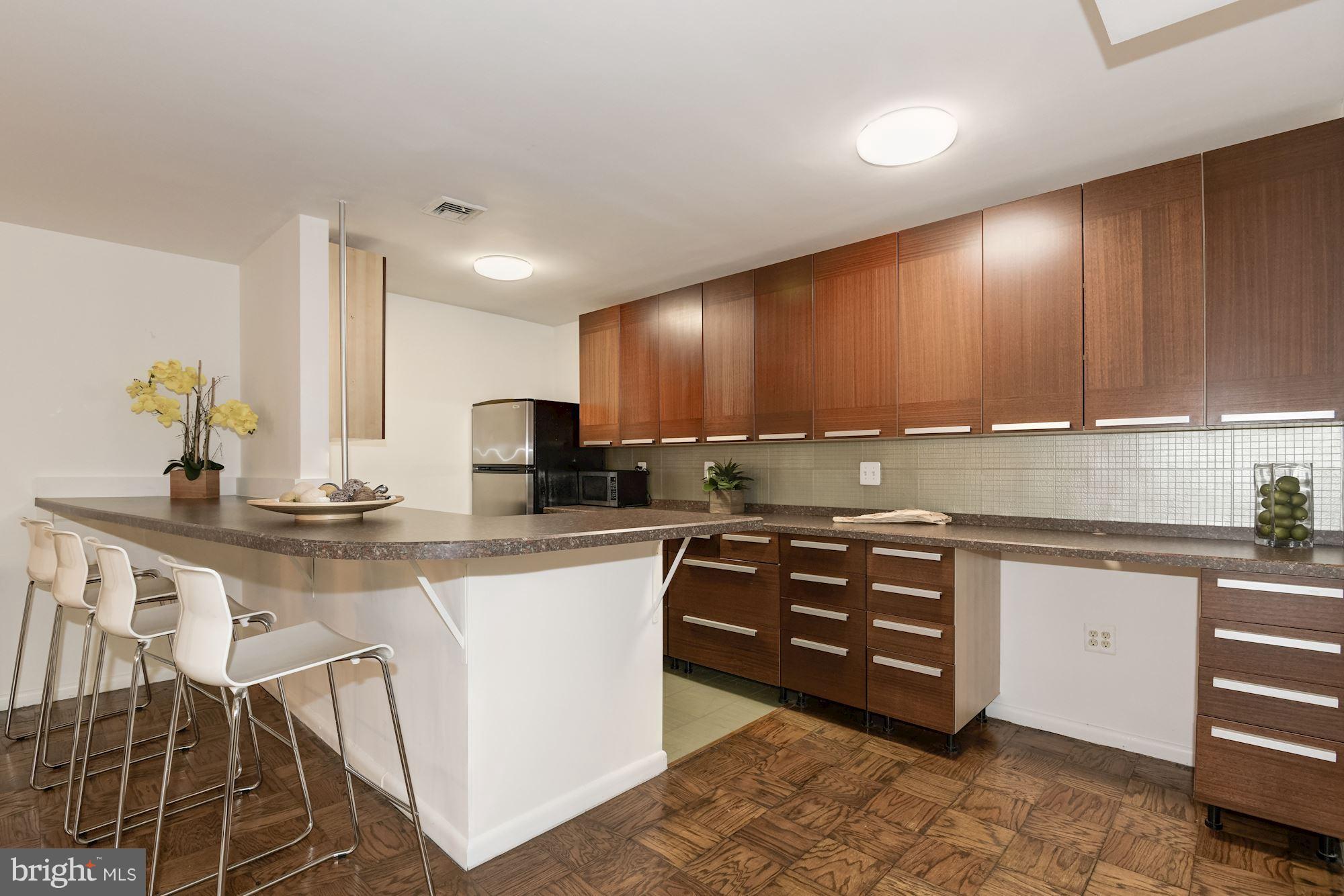 2400 41st Street Northwest, Unit 103 Washington, DC 20007 - Photo 8 of 19 Kitchen open to living area