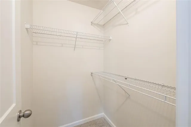 a view of a room with racks on the wall