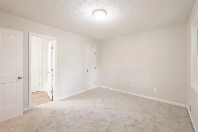 an empty room with a natural light