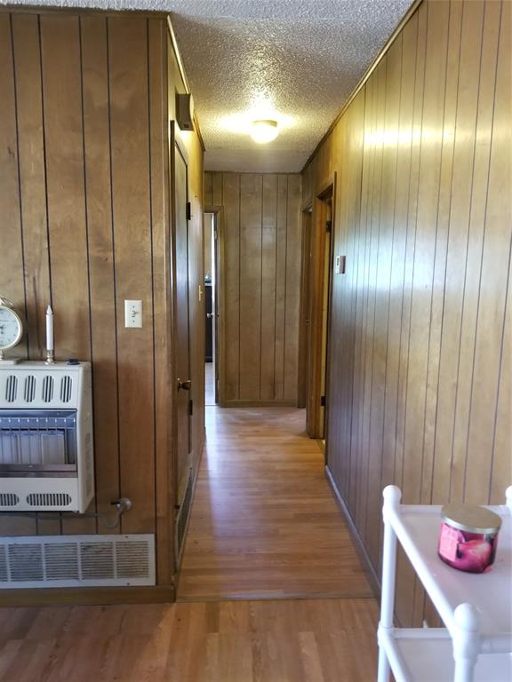 38 County Road 1180 Cooper, TX 75432 - Photo 18 of 25 a view of a hallway with wooden floor