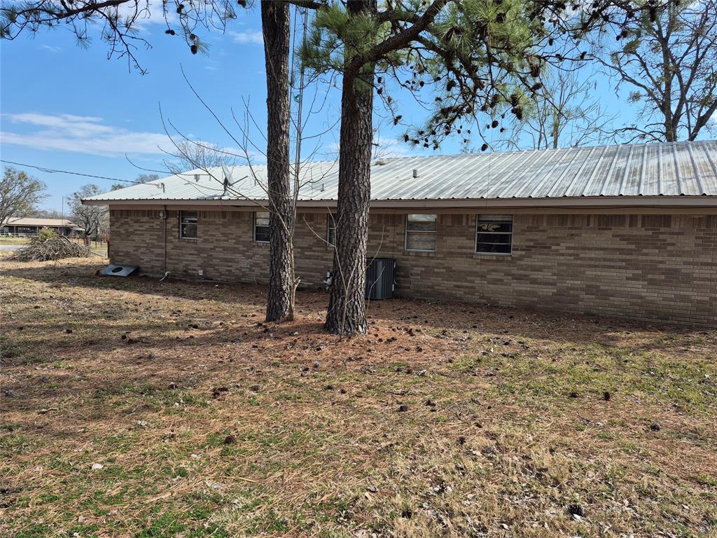 38 County Road 1180 Cooper, TX 75432 - Photo 22 of 25 a view of a backyard of the house