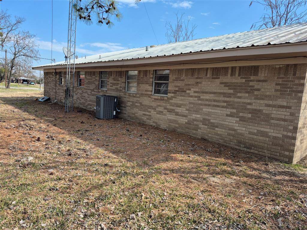 38 County Road 1180 Cooper, TX 75432 - Photo 23 of 25 a view of a house with a patio