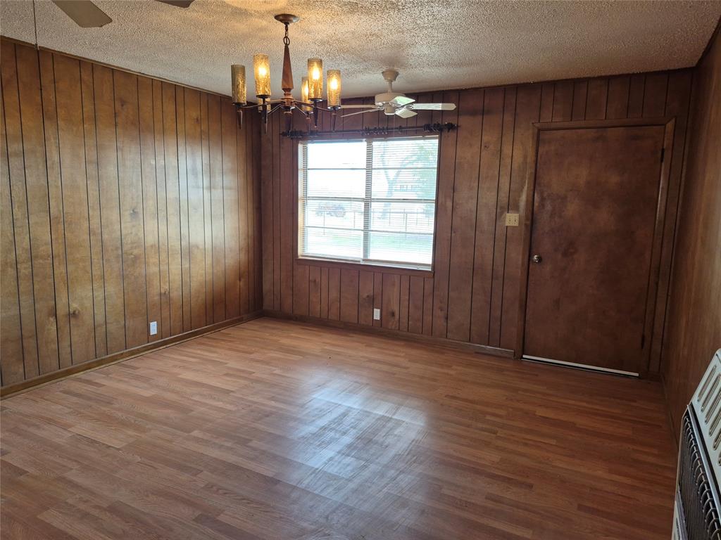 38 County Road 1180 Cooper, TX 75432 - Photo 8 of 25 an empty room with wooden floor fan and windows