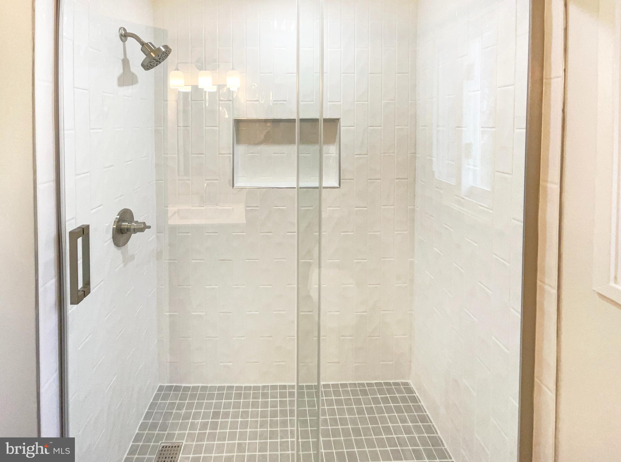 10103 Meredith Avenue Silver Spring, MD 20910 - Photo 11 of 23 a bathroom with a shower