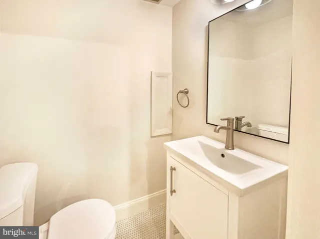 a bathroom with a sink and a toilet