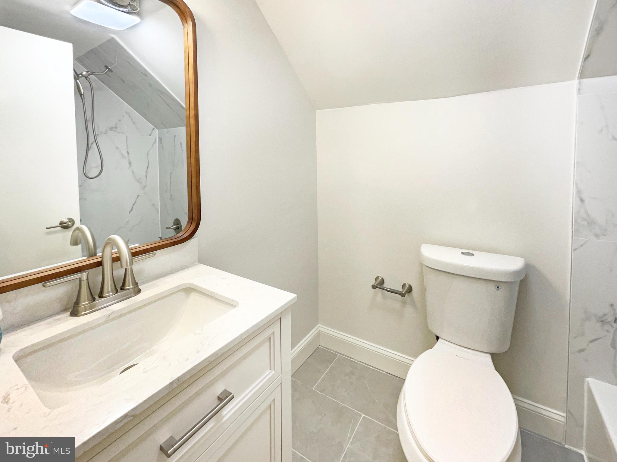 10103 Meredith Avenue Silver Spring, MD 20910 - Photo 19 of 23 a bathroom with a sink and toilet
