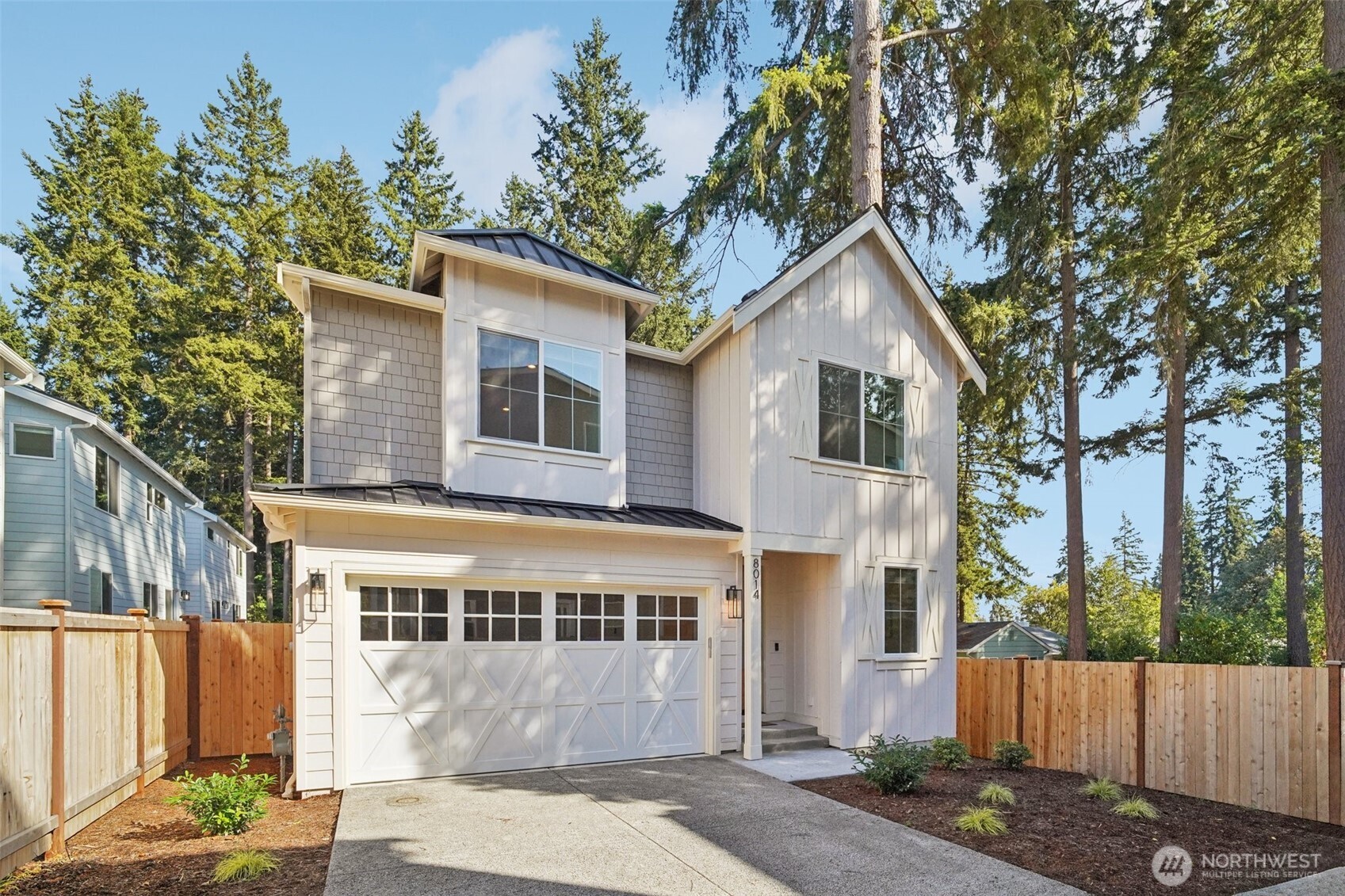 8014 222nd Street Southwest Edmonds, WA 98026 - Photo 28 of 29 a front view of a house with a garden