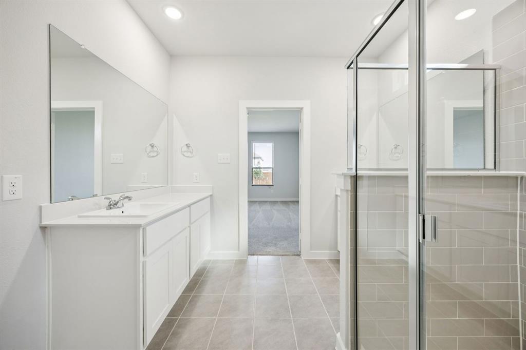 5803 Rushing River Way McKinney, TX 75071 - Photo 21 of 34 Primary Bathroom in the Masters home plan by Trophy Signature Homes – REPRESENTATIVE PHOTO