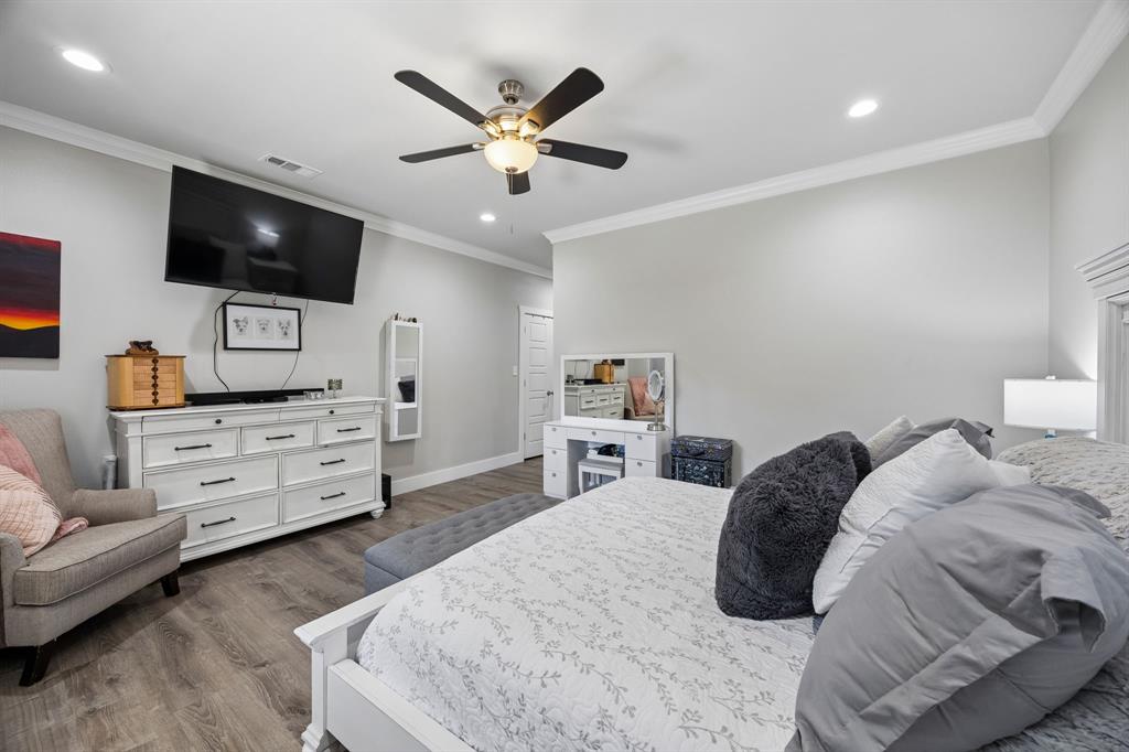 612 Frisco Road Sherman, TX 75090 - Photo 10 of 25 Primary Bedroom featuring wood-finish flooring, recessed lighting, and a ceiling fan with light fixture
