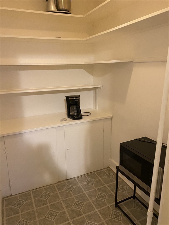 72 Florida Street, Unit 1 Boston, MA 02124 - Photo 4 of 9 a utility room with dryer and washer
