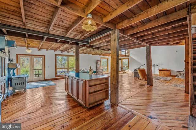 a view of a livingroom with wooden floor