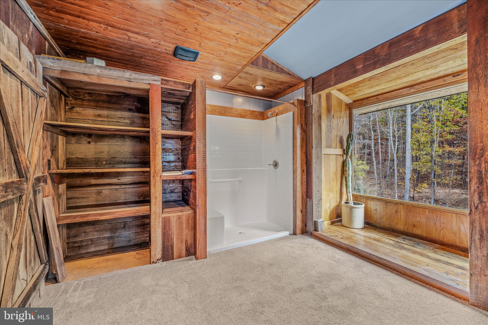 3041 Pine Grove Road Berkeley Springs, WV 25411 - Photo 24 of 99 a view of walk in closet with empty racks