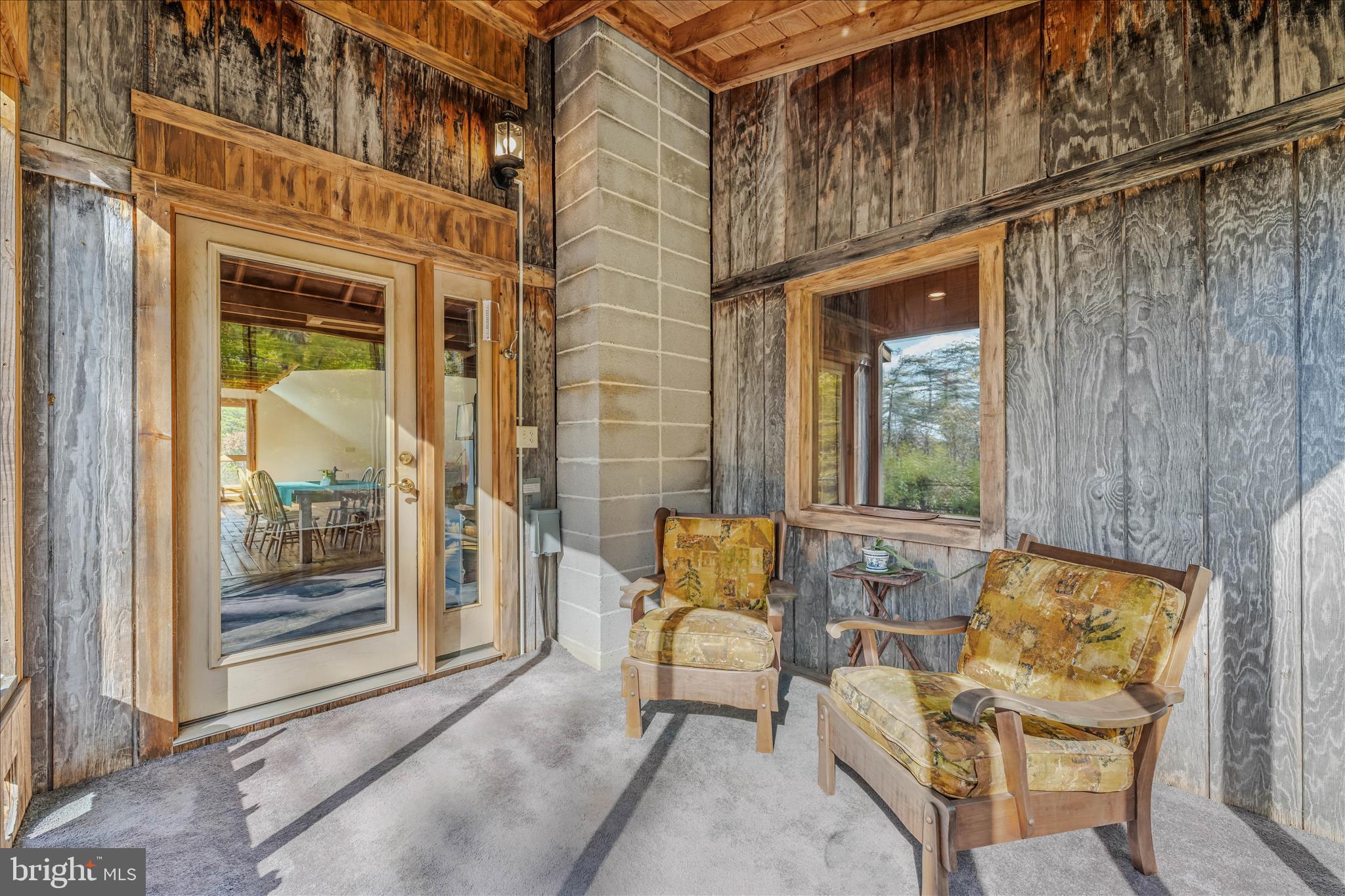 3041 Pine Grove Road Berkeley Springs, WV 25411 - Photo 26 of 99 a view of an outdoor space with seating area