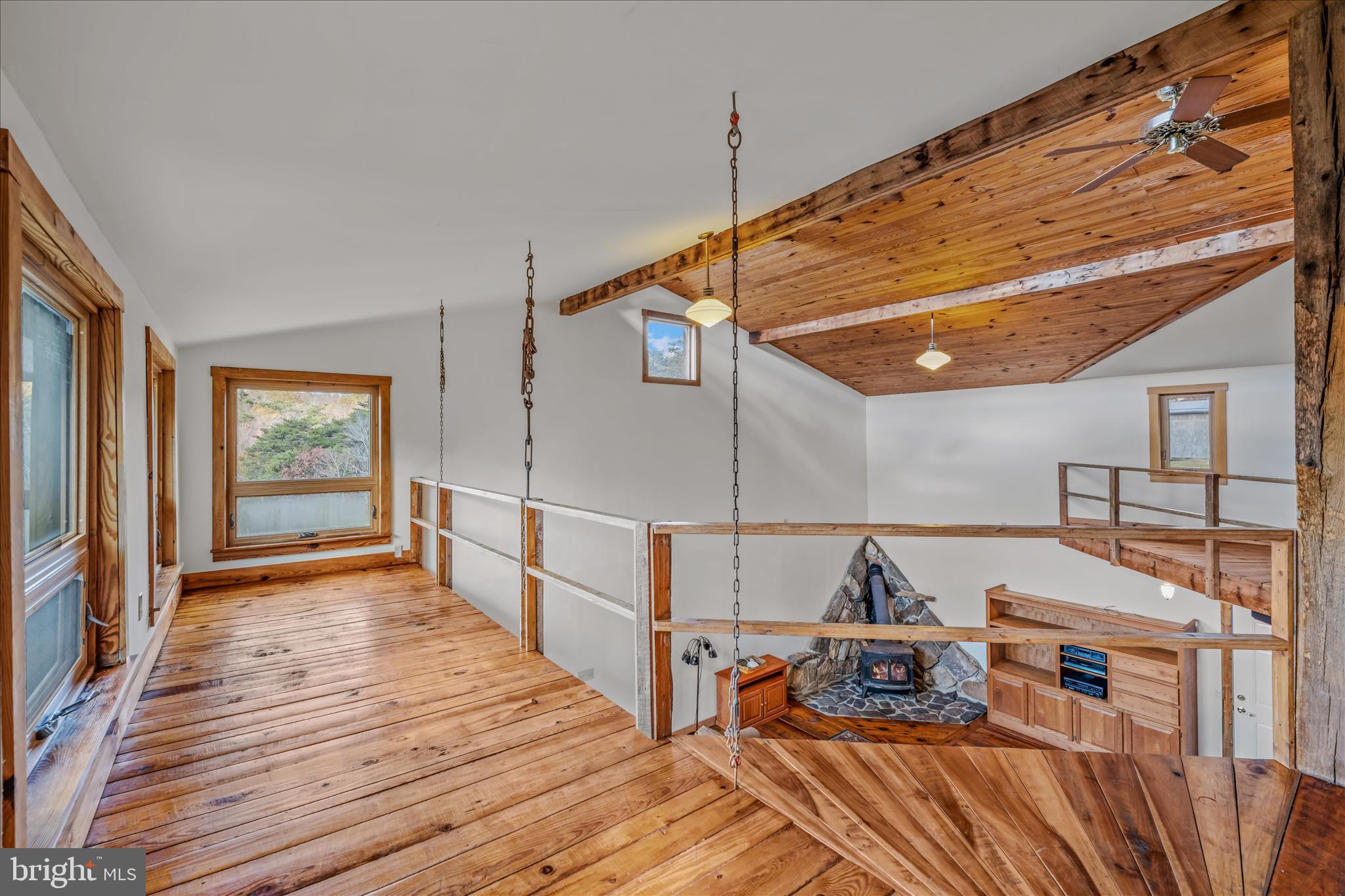3041 Pine Grove Road Berkeley Springs, WV 25411 - Photo 35 of 99 a view of a livingroom with wooden floor