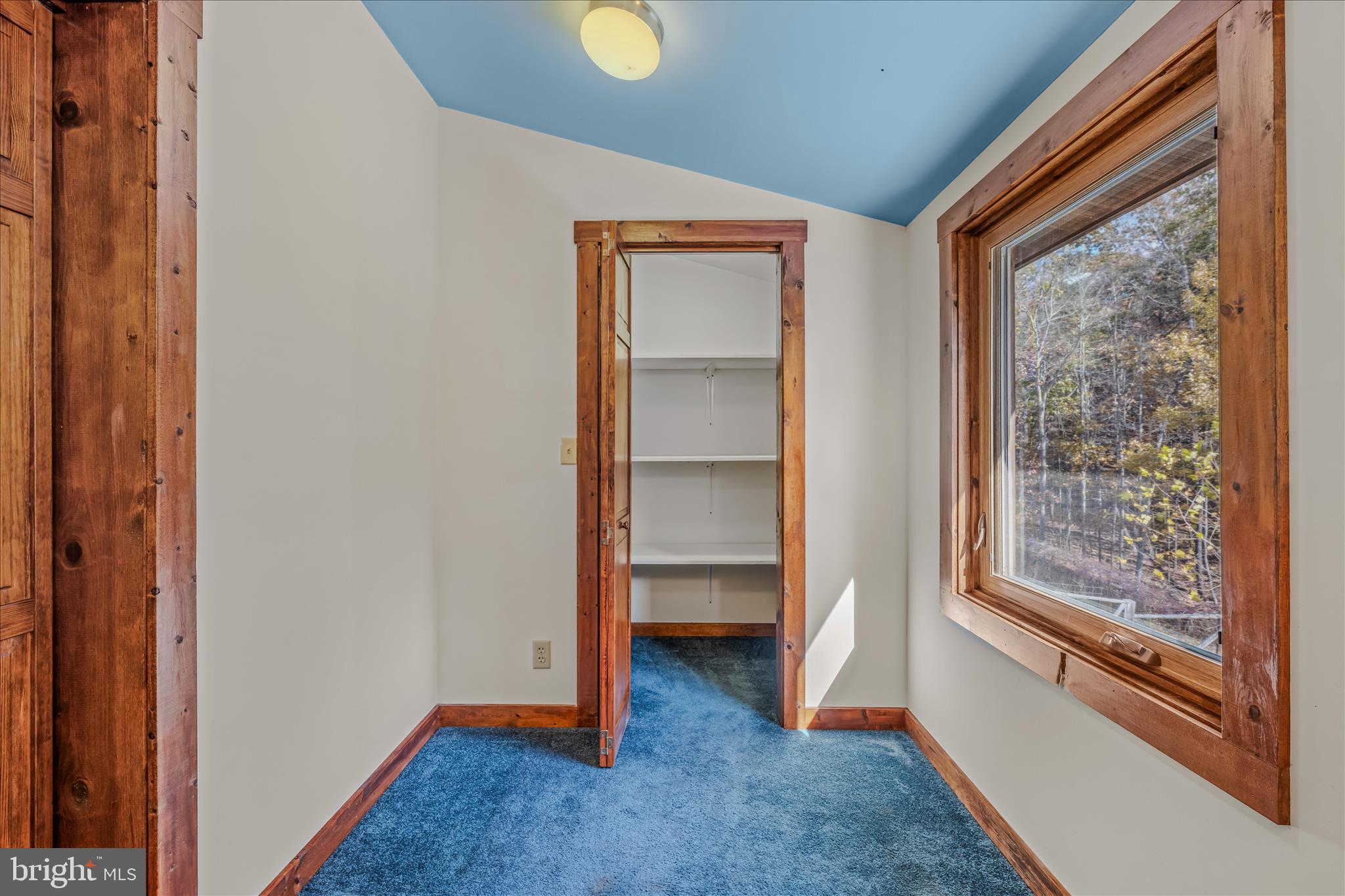 3041 Pine Grove Road Berkeley Springs, WV 25411 - Photo 43 of 99 a view of an empty room and window