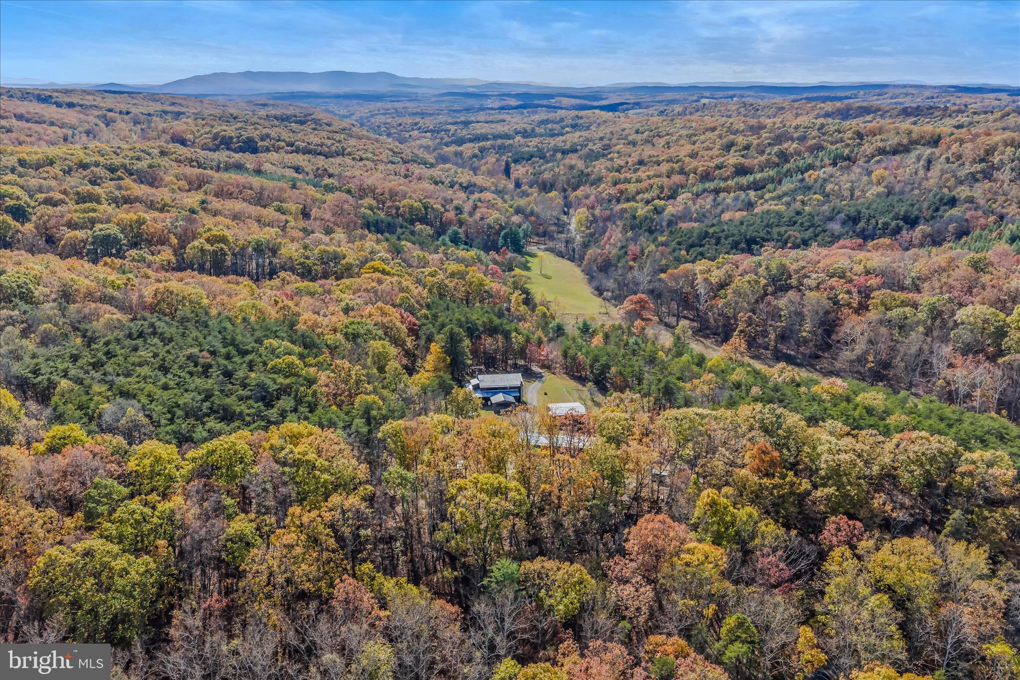 3041 Pine Grove Road Berkeley Springs, WV 25411 - Photo 88 of 99 an aerial view of house with yard and mountain view in back