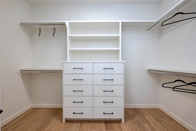 a view of an empty walk in closet