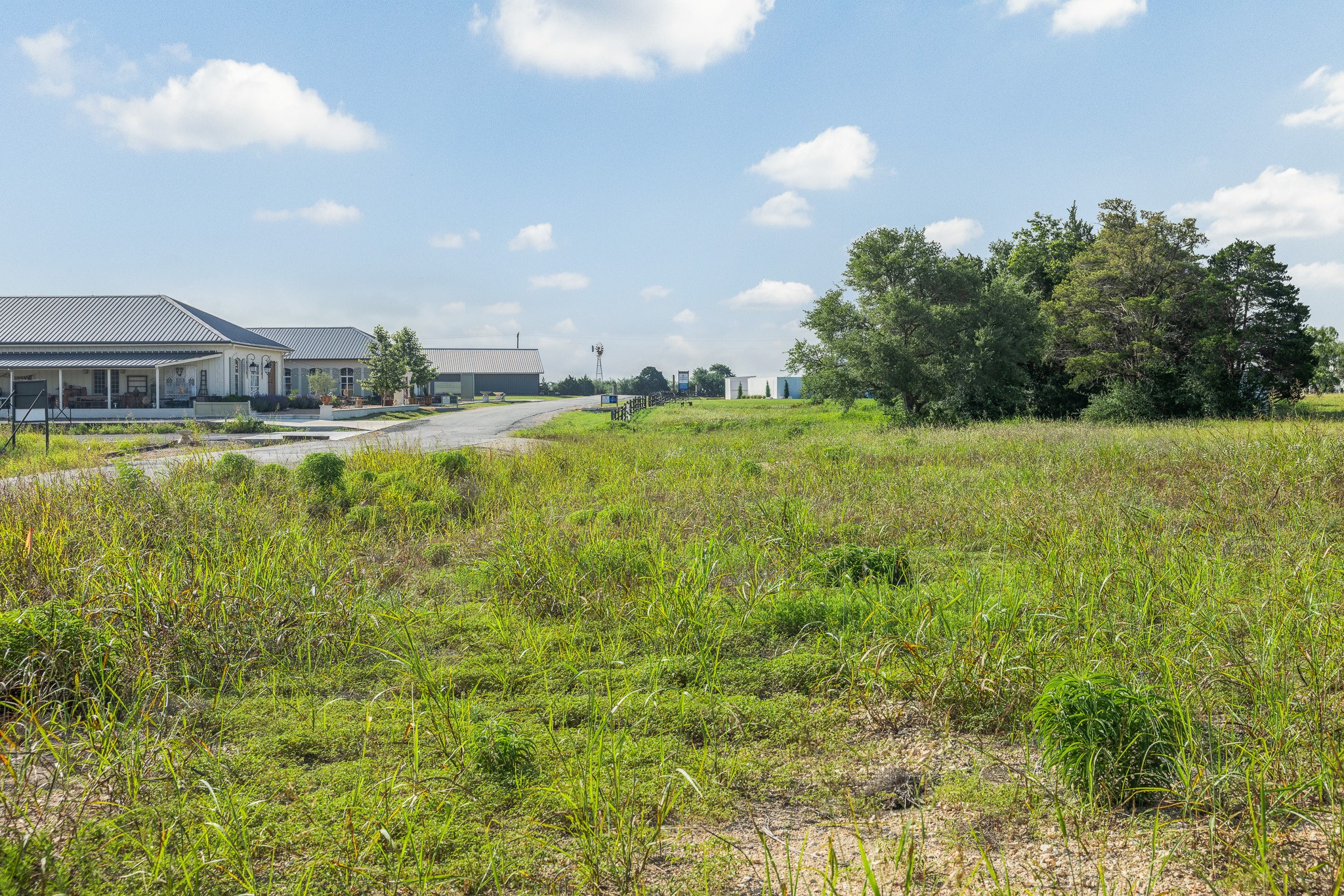 109 Compound Lane Round Top, TX 78954 - Photo 3 of 20 a view of a house with a big yard