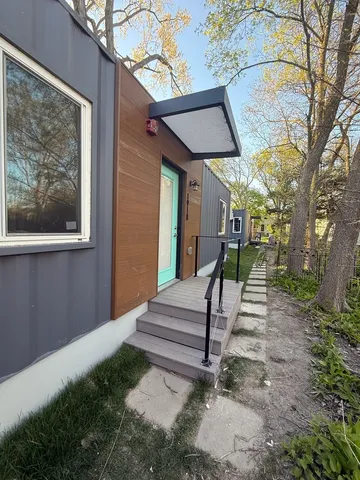 a view of a pathway with a backyard