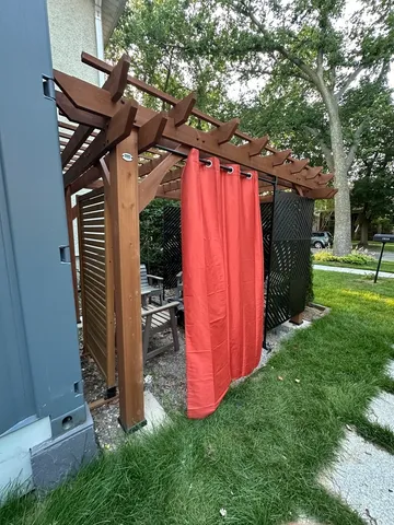 a view of yard with patio