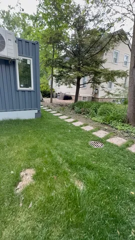 a bathroom with a sink a toilet and a shower