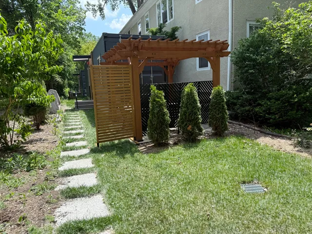 a large white kitchen with a sink a refrigerator and a stove
