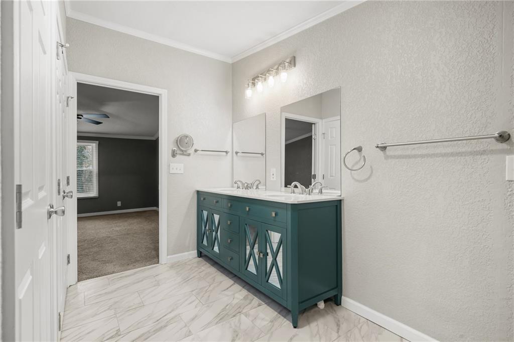 2038 Upper Salem Church Road Jasper, GA 30143 - Photo 17 of 25 a bathroom with mirror sink and vanity