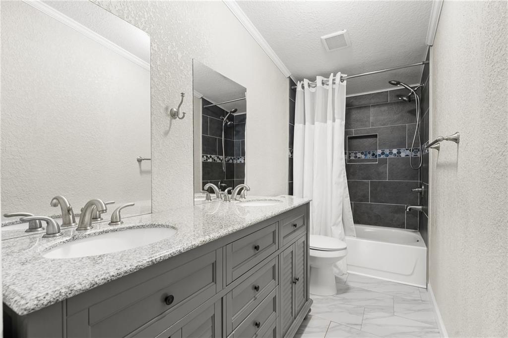 2038 Upper Salem Church Road Jasper, GA 30143 - Photo 19 of 25 a bathroom with a granite countertop sink toilet and shower