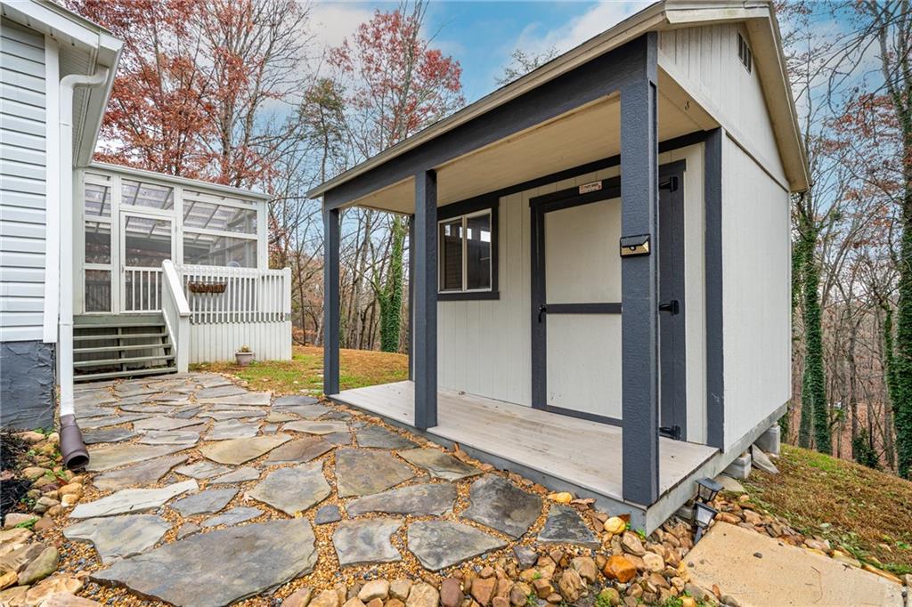 2038 Upper Salem Church Road Jasper, GA 30143 - Photo 3 of 25 a view of a house with a backyard