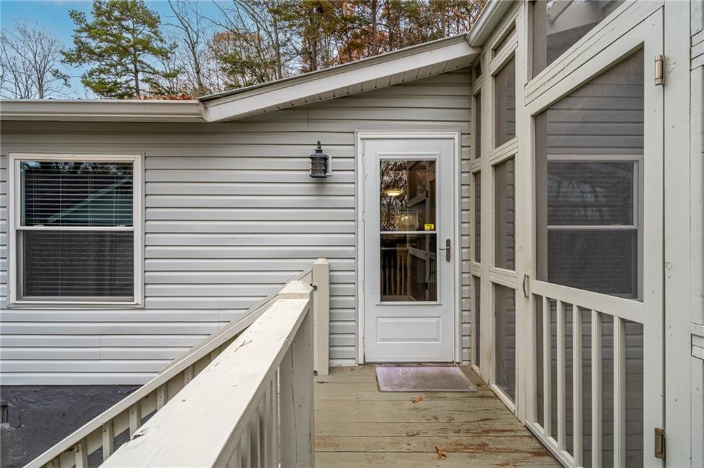 2038 Upper Salem Church Road Jasper, GA 30143 - Photo 5 of 25 a view of a balcony with two windows