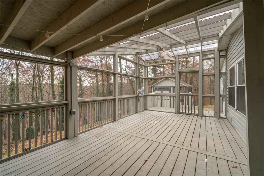 2038 Upper Salem Church Road Jasper, GA 30143 - Photo 7 of 25 a view of a balcony with wooden floor
