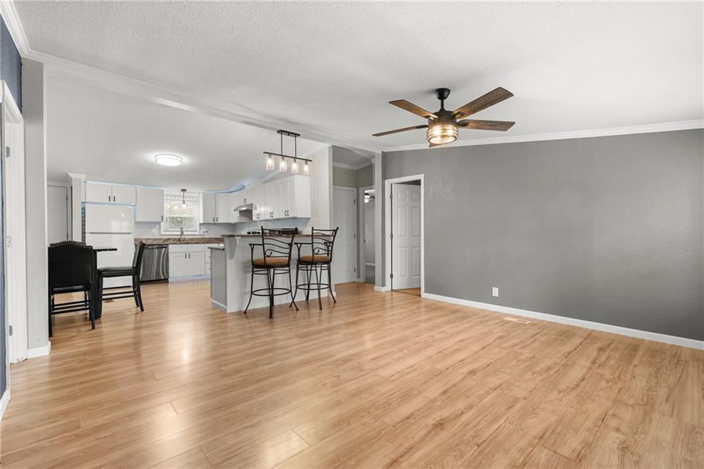 2038 Upper Salem Church Road Jasper, GA 30143 - Photo 8 of 25 a view of a livingroom with furniture and a ceiling fan