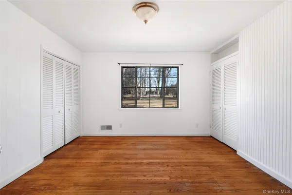 an empty room with window