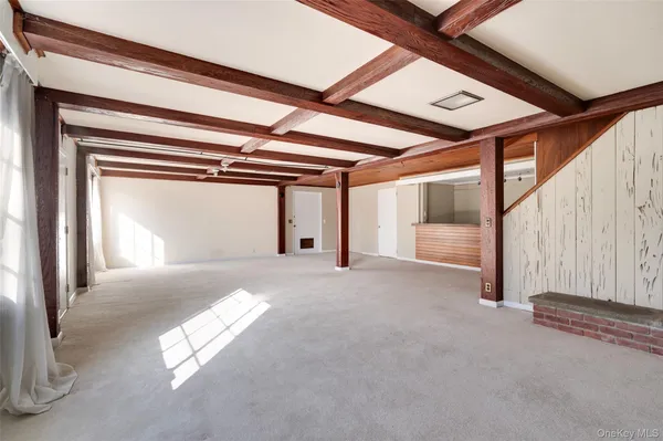a view of a room with stairs