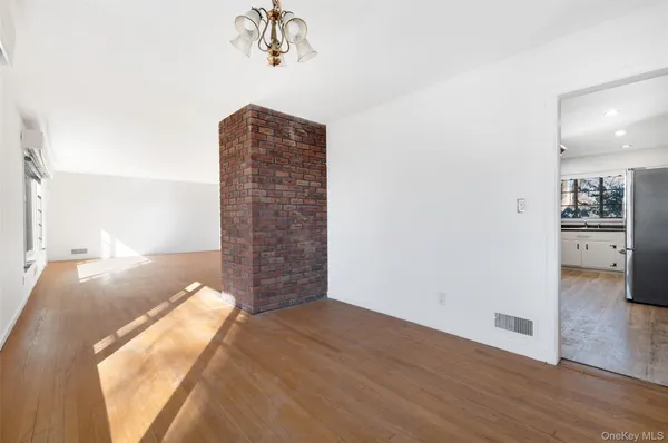 a view of livingroom with wooden floor