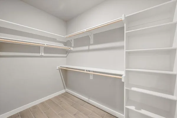 a view of an empty walk in closet