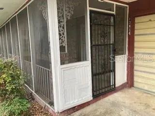 a view of a porch with a door