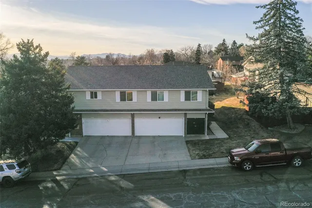 a car parked in front of a house
