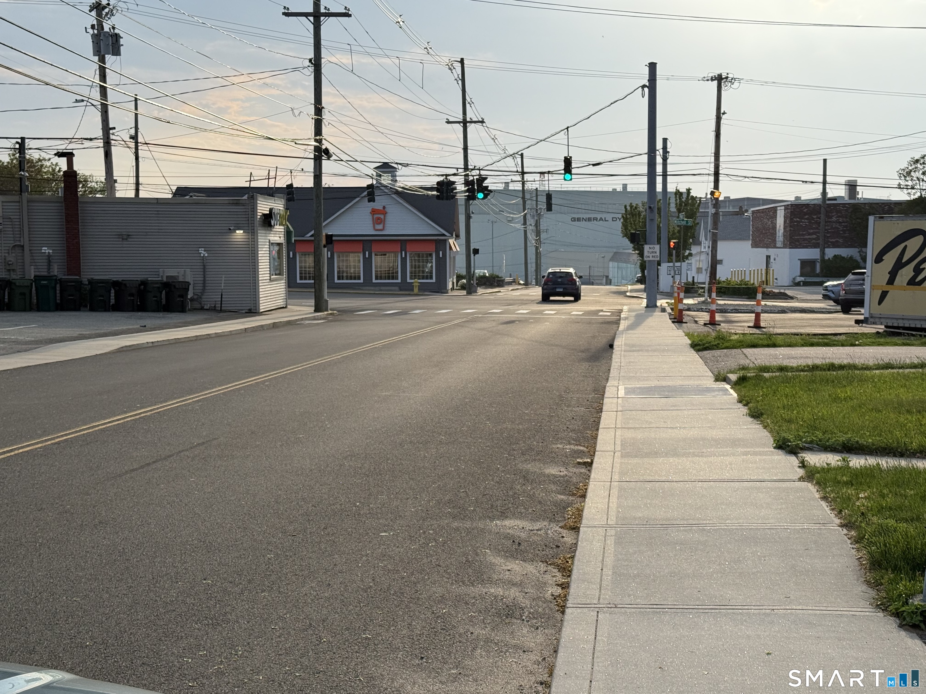 231 Poquonnock Road Groton, CT 06340 - Photo 25 of 30 a view of a city street lined with buildings