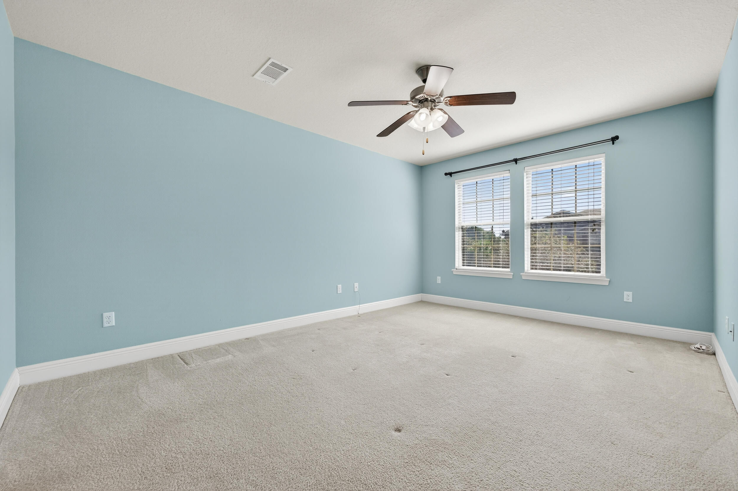 8900 White Ibis Way Navarre, FL 32566 - Photo 20 of 37 a view of an empty room with a window