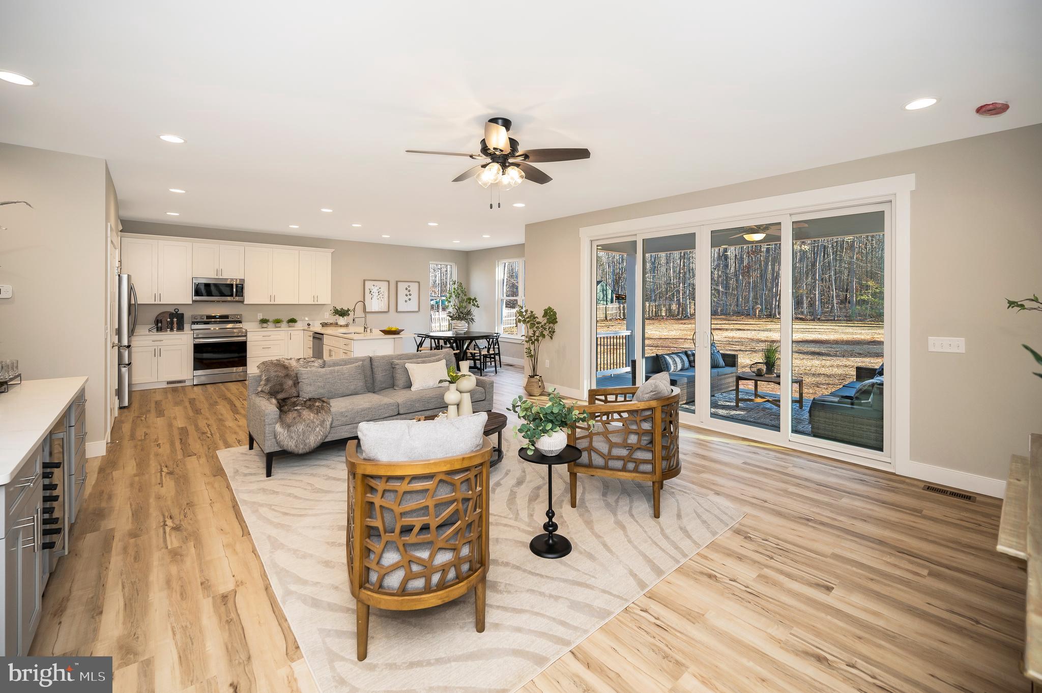 31 Boxwood Road Bumpass, VA 23024 - Photo 7 of 28 Open Family Room with multi slide door to deck